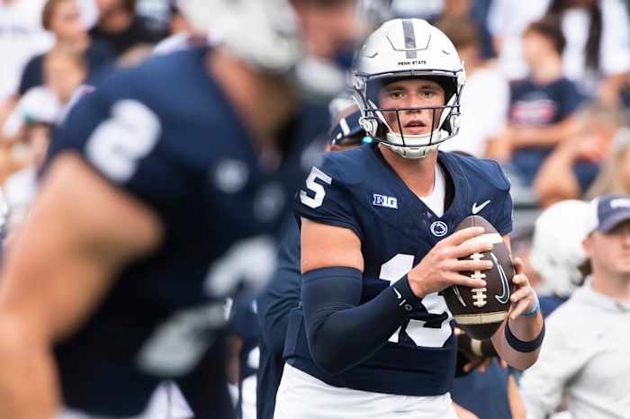 Penn State quarterback Drew Allar looks downfield to pass against Delaware at Beaver Stadium.